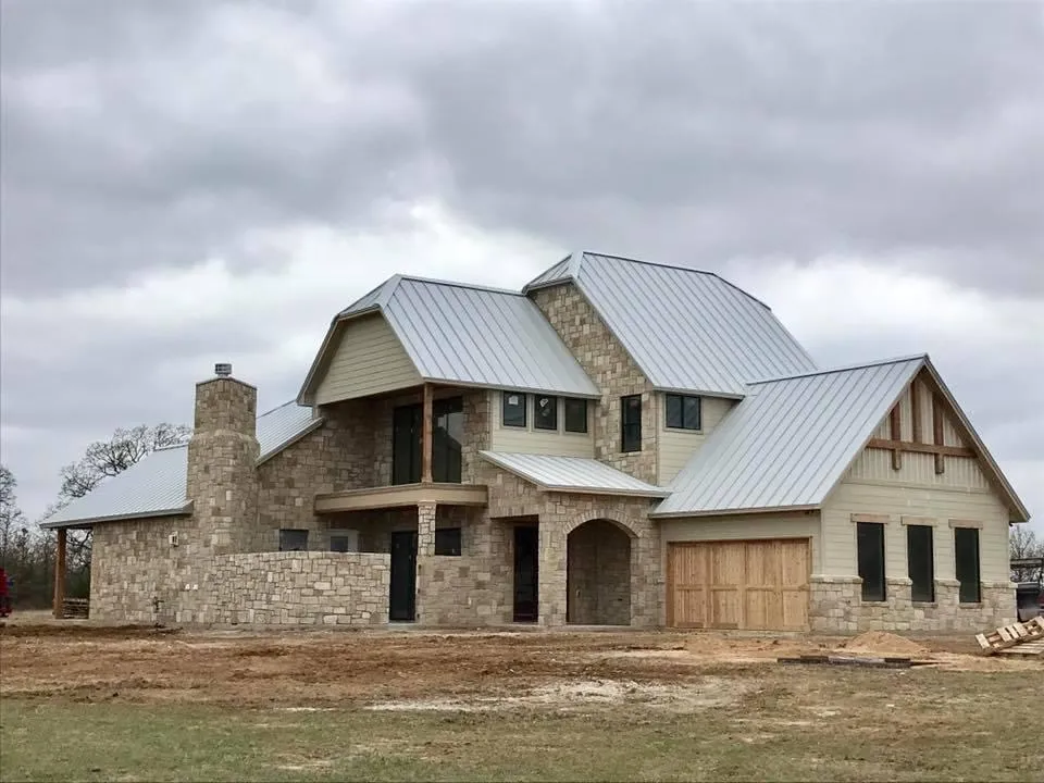 Custom home exterior by Jack Steed Homes — view 11